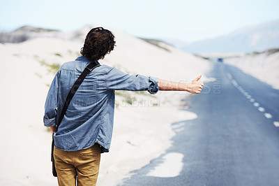 Buy stock photo Back, man or hitchhiker in nature on road for travel, destination or road trip with thumbs up in street. Rear View, person or hand gesture outdoor or hitchhiking, transportation and waiting in summer