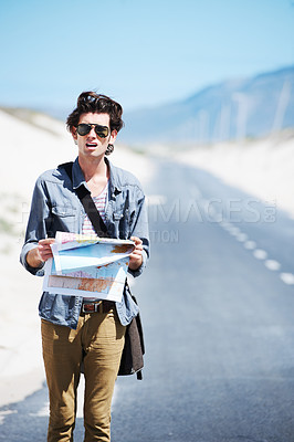 Buy stock photo Lost, man and reading a map on a road trip, journey or planning travel on a highway. Check, location and confused person with destination on adventure or search countryside for direction to city