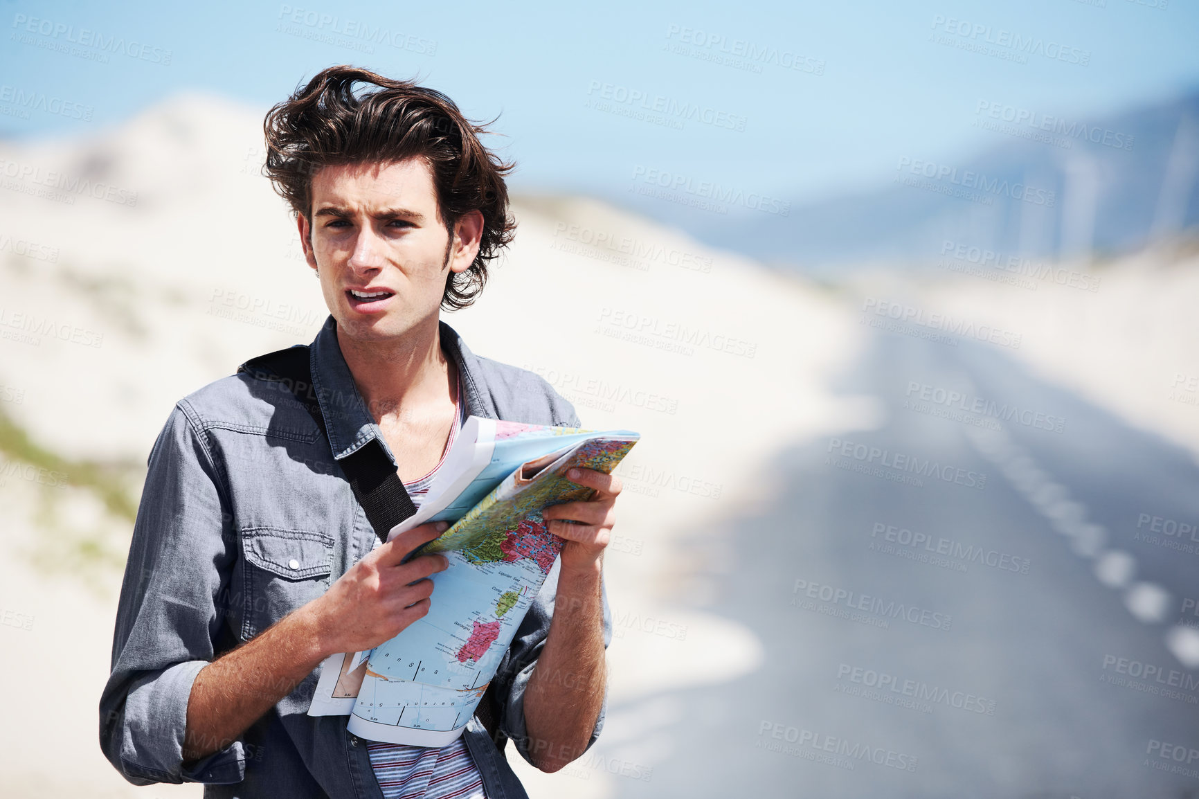 Buy stock photo Lost, man and reading a map on a road trip, journey or planning travel on a highway. Check, location and confused person with paper maps, destination and search for direction to city in countryside