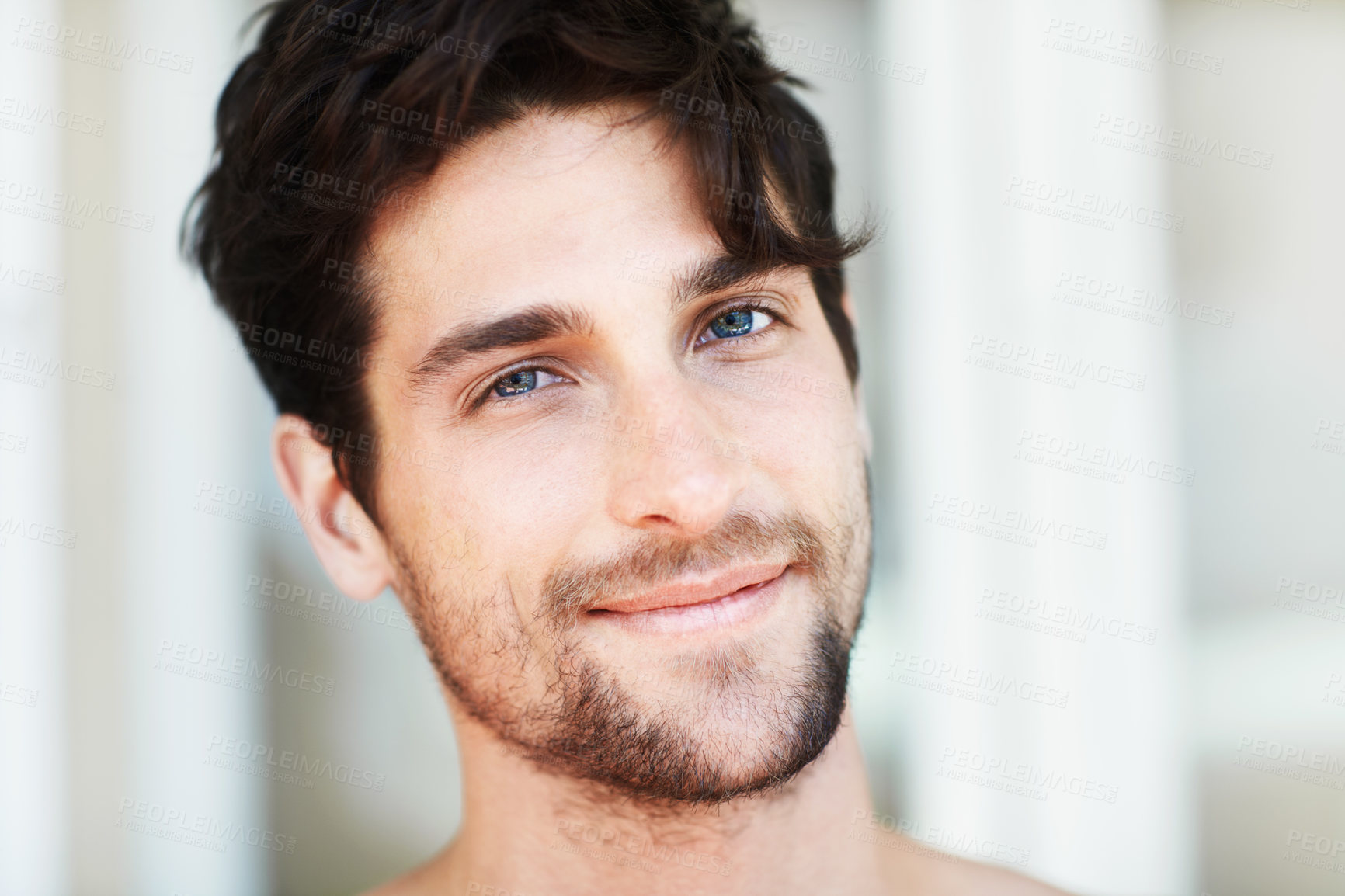 Buy stock photo Handsome young male smiling and looking at the camera