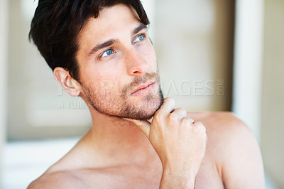 Buy stock photo Thinking, skincare and man with cosmetics, decision and grooming routine with thoughts, treatment and beauty. Male person, wellness and guy with wonder, opportunity and self care with dermatology