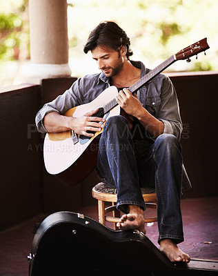 Buy stock photo Music, art and man playing guitar with musical talent for practice for a performance or concert. Performer, outdoor and male musician, guitarist or artist performing a song on a string instrument.