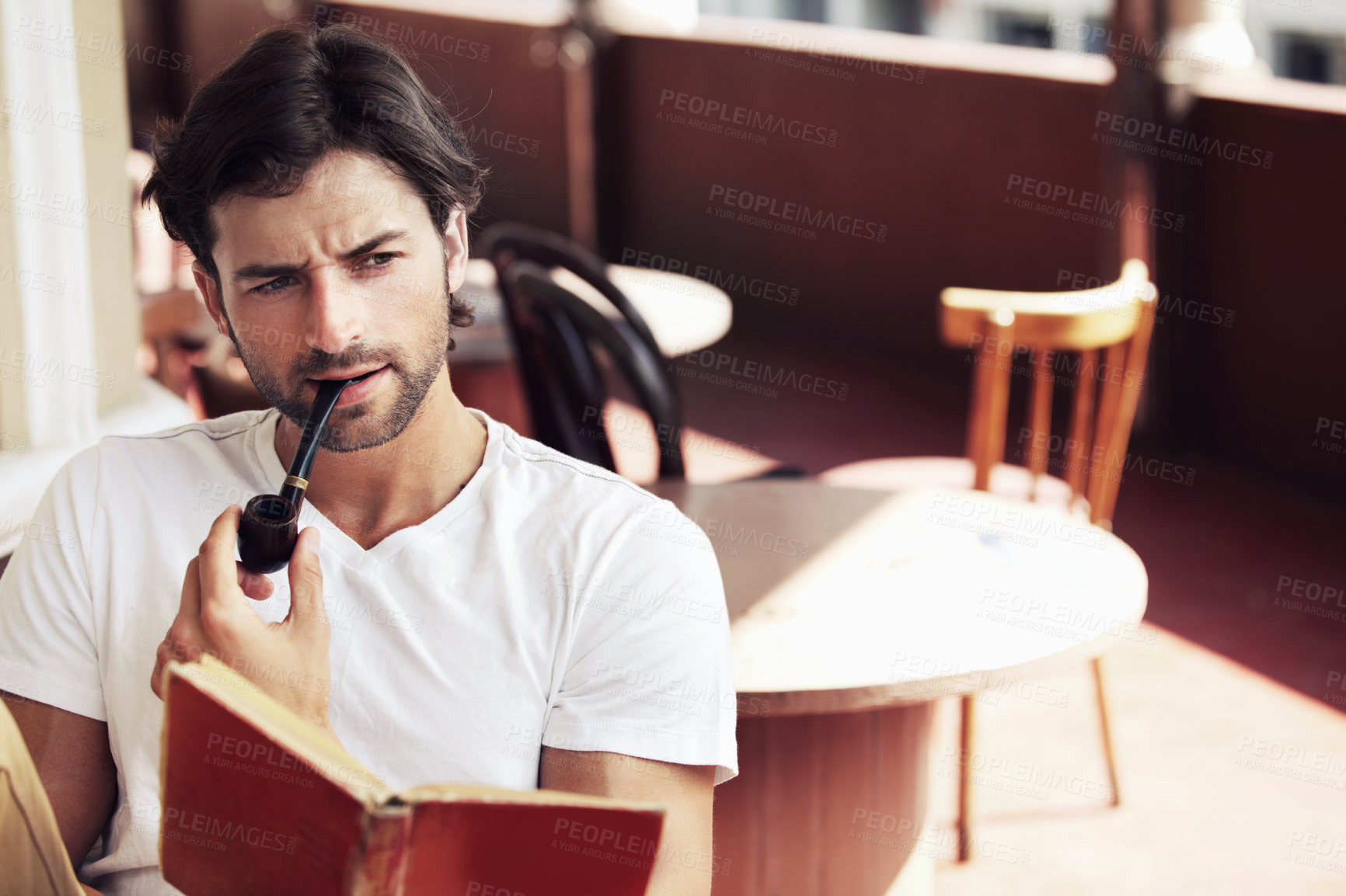 Buy stock photo Young, man and smoke while thinking in cafe in Paris with book on vacation, holiday or trip. Person, tobacco pipe and travel to relax for wellness with vision, idea and dream of startup business
