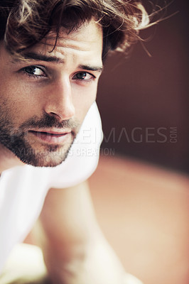 Buy stock photo Handsome young male looking at you with warm brown eyes