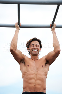 Buy stock photo Pull up bar, happiness and man exercise for muscle building, bodybuilder performance or outdoor strength development. Fitness, sports training and athlete happy for workout, challenge or practice