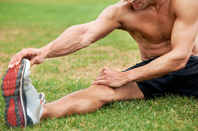 Buy stock photo Fitness, stretching legs and man on field for workout, summer sports and wellness in outdoor training. Exercise, warm up and shirtless athlete on grass for health, muscle and body care commitment.