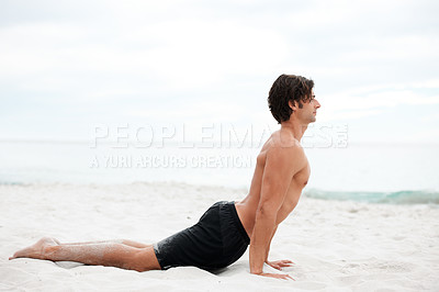 Buy stock photo Man, yoga and stretch on beach sand for relax summer, zen or sunshine exercise for health. Male person, cobra pose and muscle for holistic sea practice, spiritual balance or calm ocean mockup
