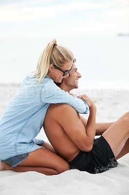 Buy stock photo Couple, holiday and beach sand hug smile for Maldives summer, outdoor romance or vacation. Man, woman or happy at ocean fresh air in embrace for connection or love trust together, relax in sunshine