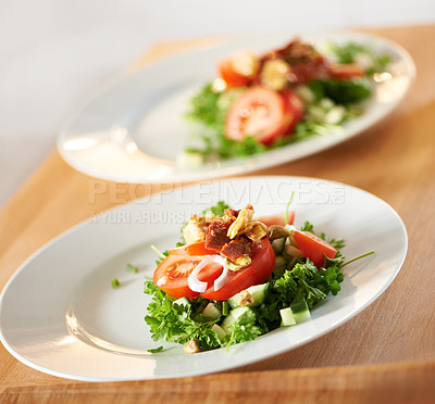 Buy stock photo A delicious salad arranged on a white plate