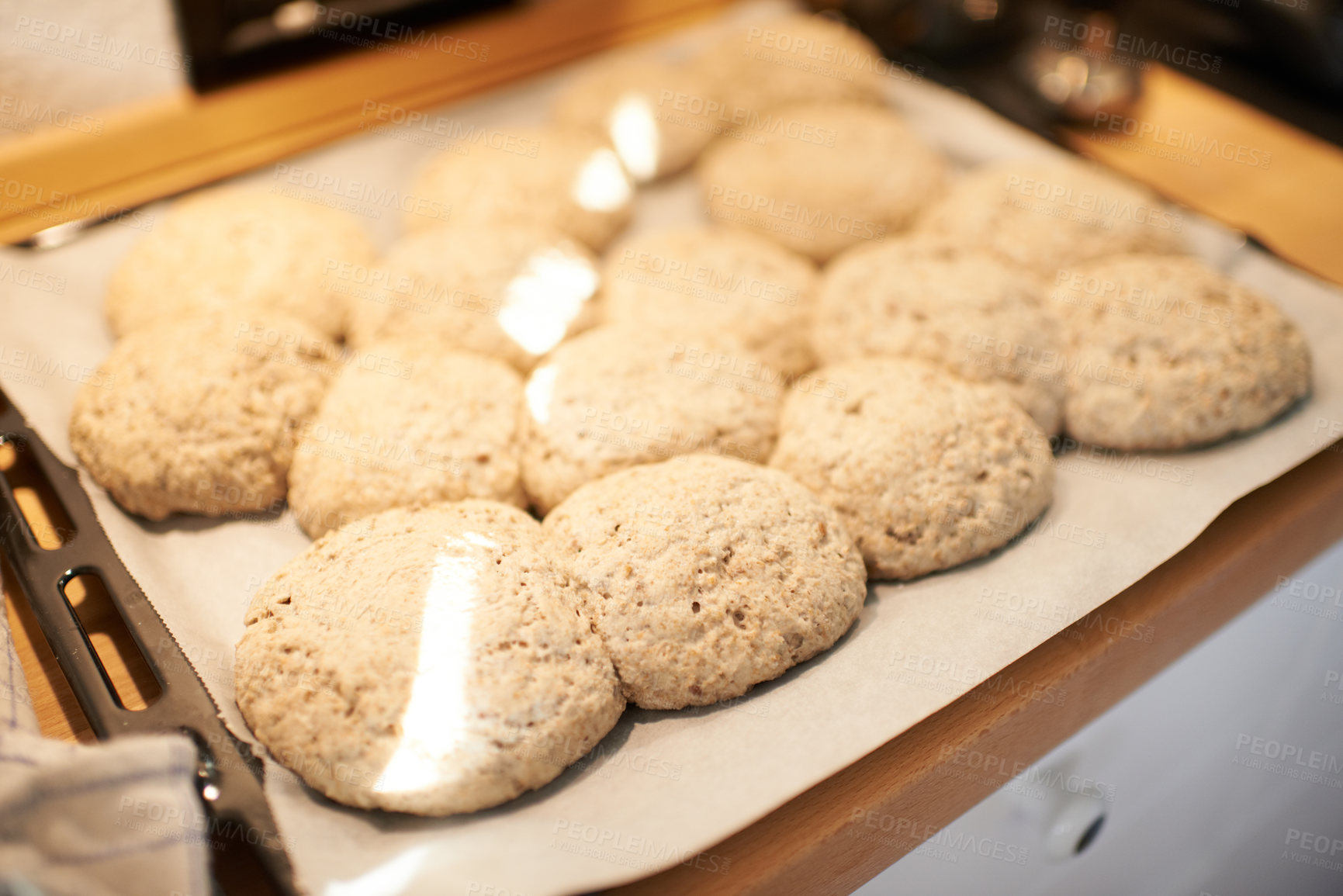 Buy stock photo Closeup, tray and bread in an oven from a bakery for diet, nutrition and eating pastry food. Zoom, health and carbs, pita or loaves of rolls on a shelf for baking, cooking or lunch at a restaurant