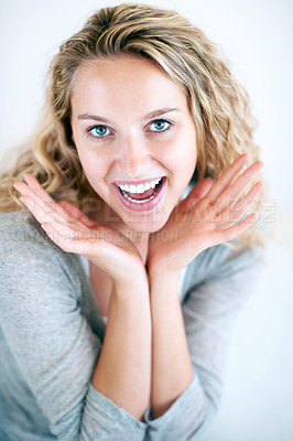 Buy stock photo Woman, portrait and hands face for fun play, confidence or attractive smile. Female person, happy emoji gesture and white background for good attitude, carefree or joyful relax personality in Canada