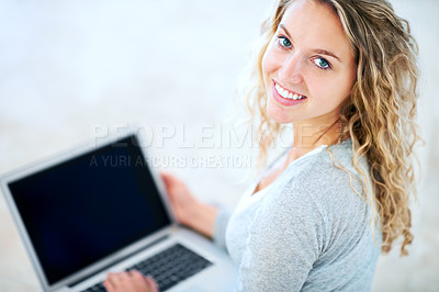 Buy stock photo Laptop, portrait and happy woman in home, typing email and internet. Computer, face and smile of girl in living room on social media, website or online communication on tech to relax on mockup space
