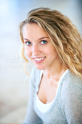 Buy stock photo Portrait of a pretty young blonde smiling at you sweetly