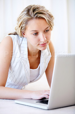 Buy stock photo Laptop, typing and woman in home on floor for network, reading email and remote work. Computer, internet and freelance person on social media, website and online communication on digital technology