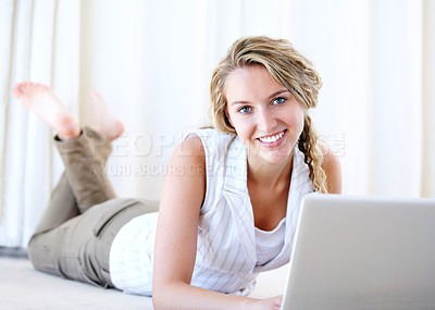 Buy stock photo Laptop, portrait and happy woman in house on floor, typing email or network on internet. Computer, smile and face of person or girl on social media, website and communication on digital tech to relax