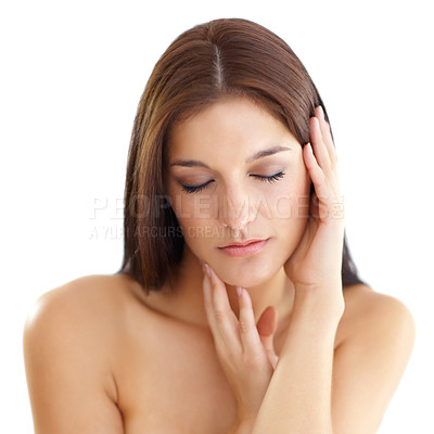 Buy stock photo Face, beauty and skincare with a woman in studio isolated on a white background for natural aesthetic. Hands, skin and a confident young model touching her cheeks closeup for self love or care