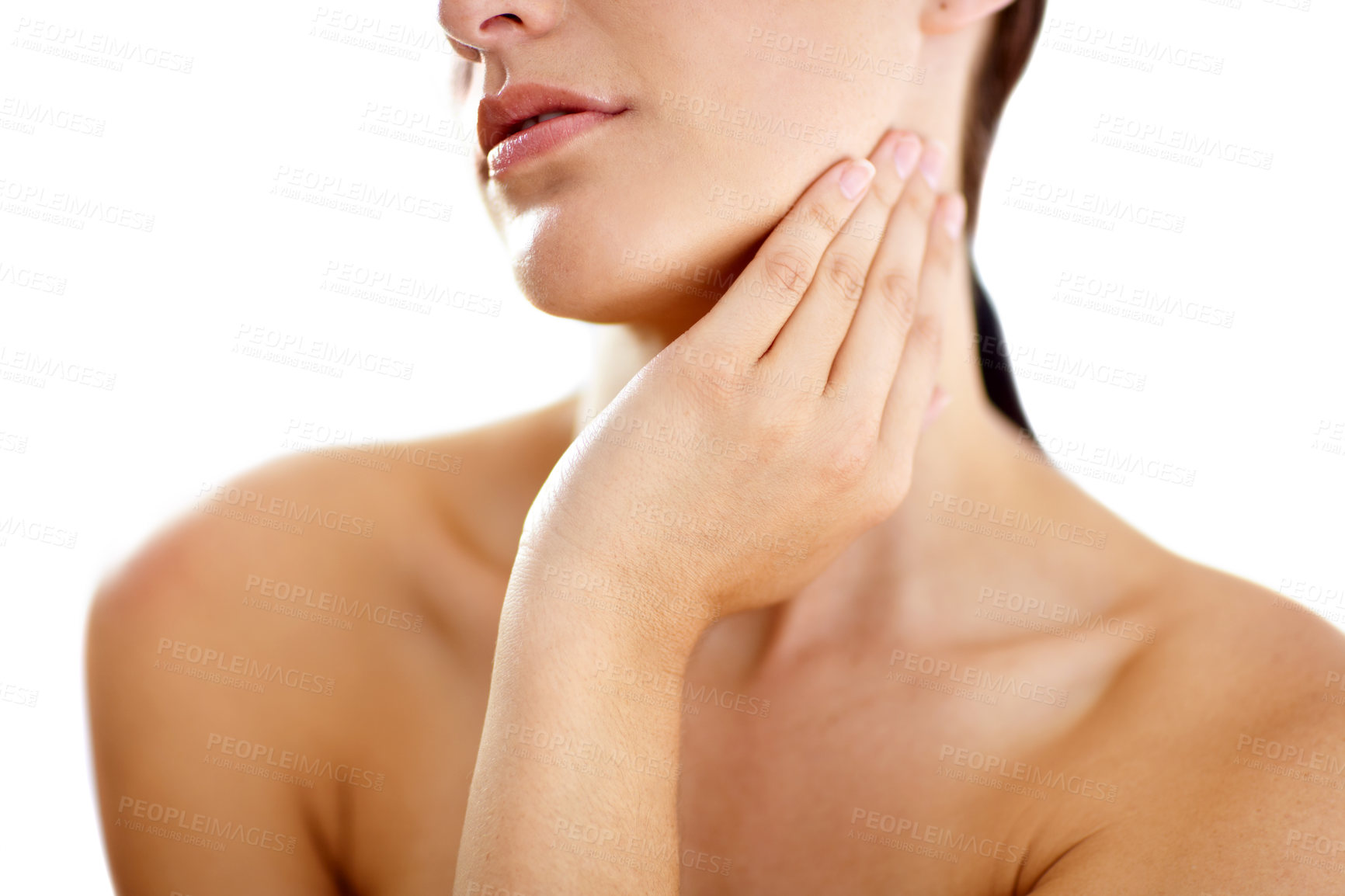Buy stock photo Cropped image of a young woman with her hand on her neck