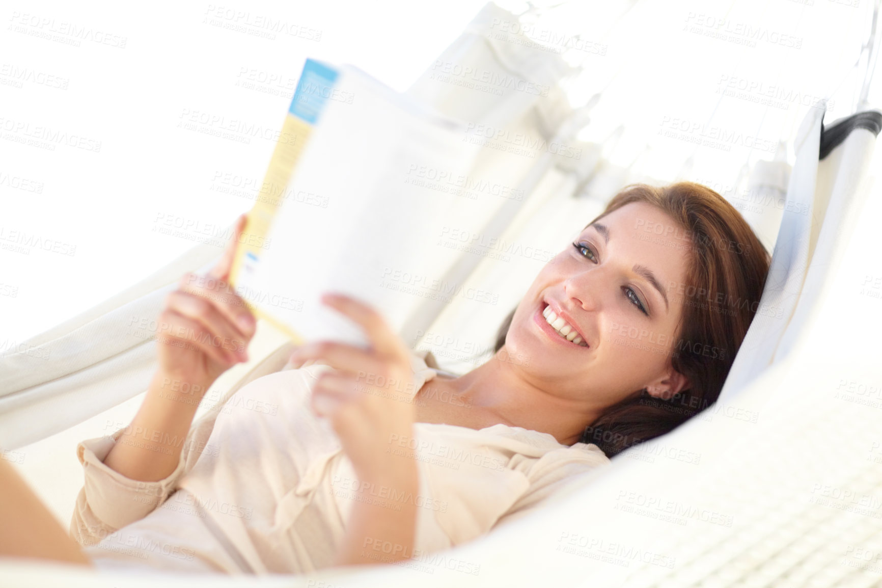 Buy stock photo Happy woman, relax and reading book on hammock for holiday, weekend or break in leisure at home. Female person, lying and smile with novel in comfort for knowledge, literature or story at house