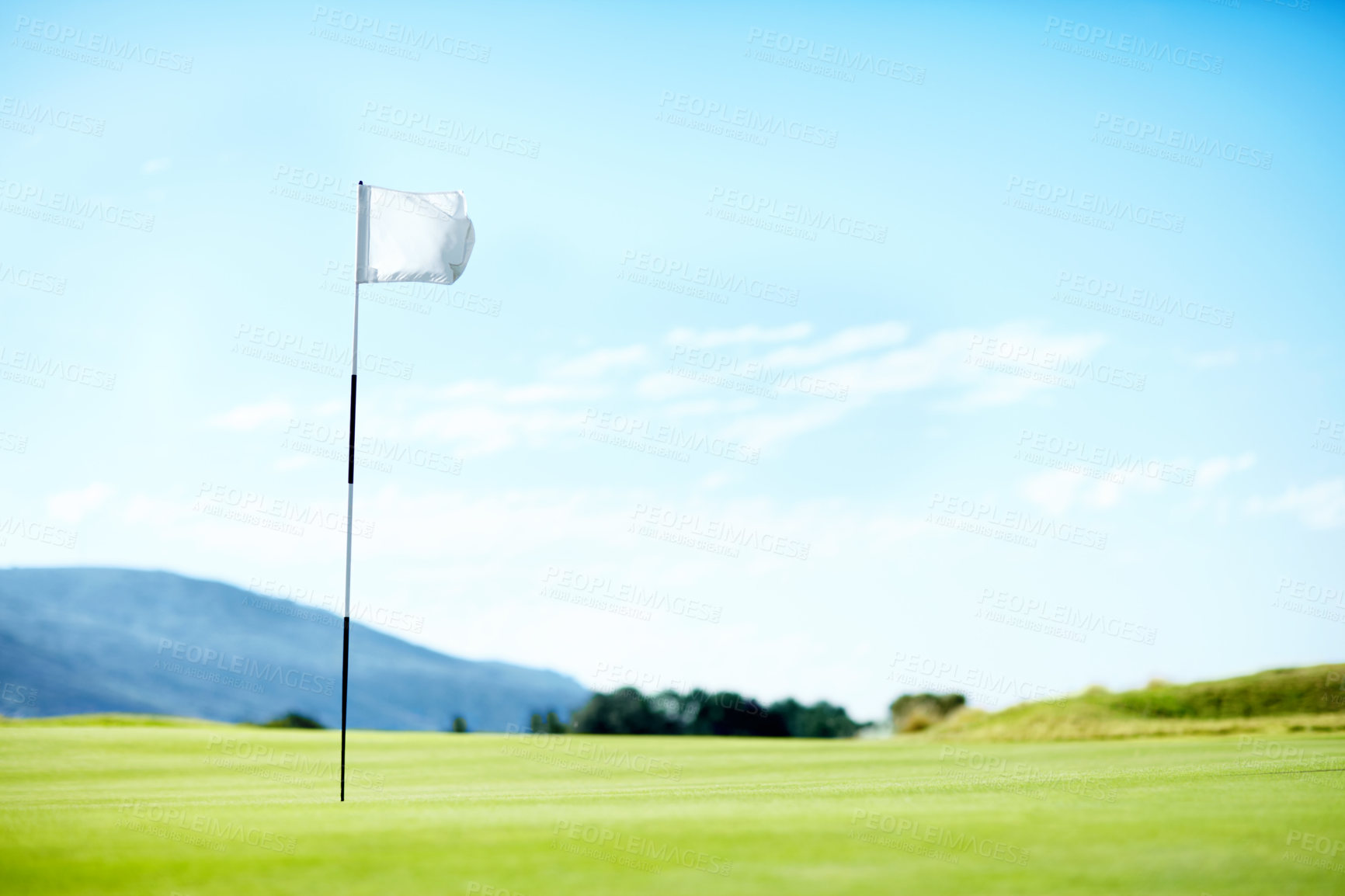 Buy stock photo Flag marking a hole on the golf course