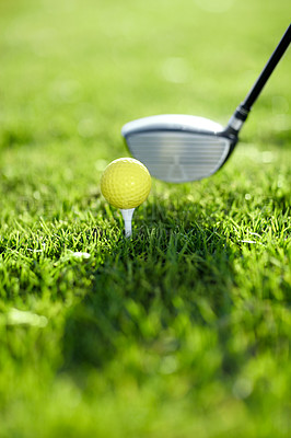 Buy stock photo Closeup, golf ball and tee for swing on driving range for sports competition, recreation hobby or practice. Target, challenge and tournament on field in summer for training with equipment on grass
