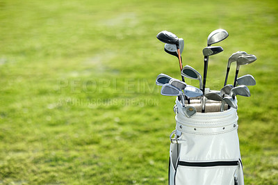 Buy stock photo A golf bag on the golf course