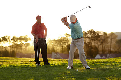 Buy stock photo Two male golfers going through a round of golf