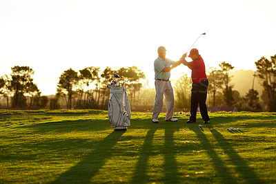 Buy stock photo Trainer, golf course or man with help, teaching or fitness with training, lesson or skills. Male person, player or coach with golfer, advice or sports with professional, physical activity or exercise
