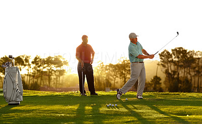 Buy stock photo Sunset, golf and men on a course for training, competition or professional game. Fitness, summer and friends on the grass golfing during retirement for holiday, hobby and recreation at a club