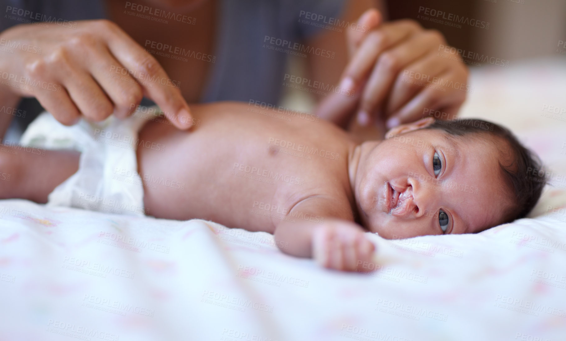 Buy stock photo Care, portrait and a baby with a cleft palate being changed, playing and hands of a mother with love. Family, health and a newborn child with a disability and a mama or parent for childcare