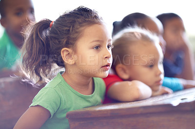 Buy stock photo Cute little preschoolers sitting in a classroom together