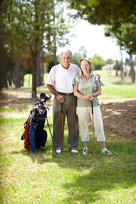 Buy stock photo Happy old couple, portrait or golfers on course in fitness workout, exercise or round together on field. Embrace, healthy elderly man relaxing or smiling in golfing sports game with senior woman 