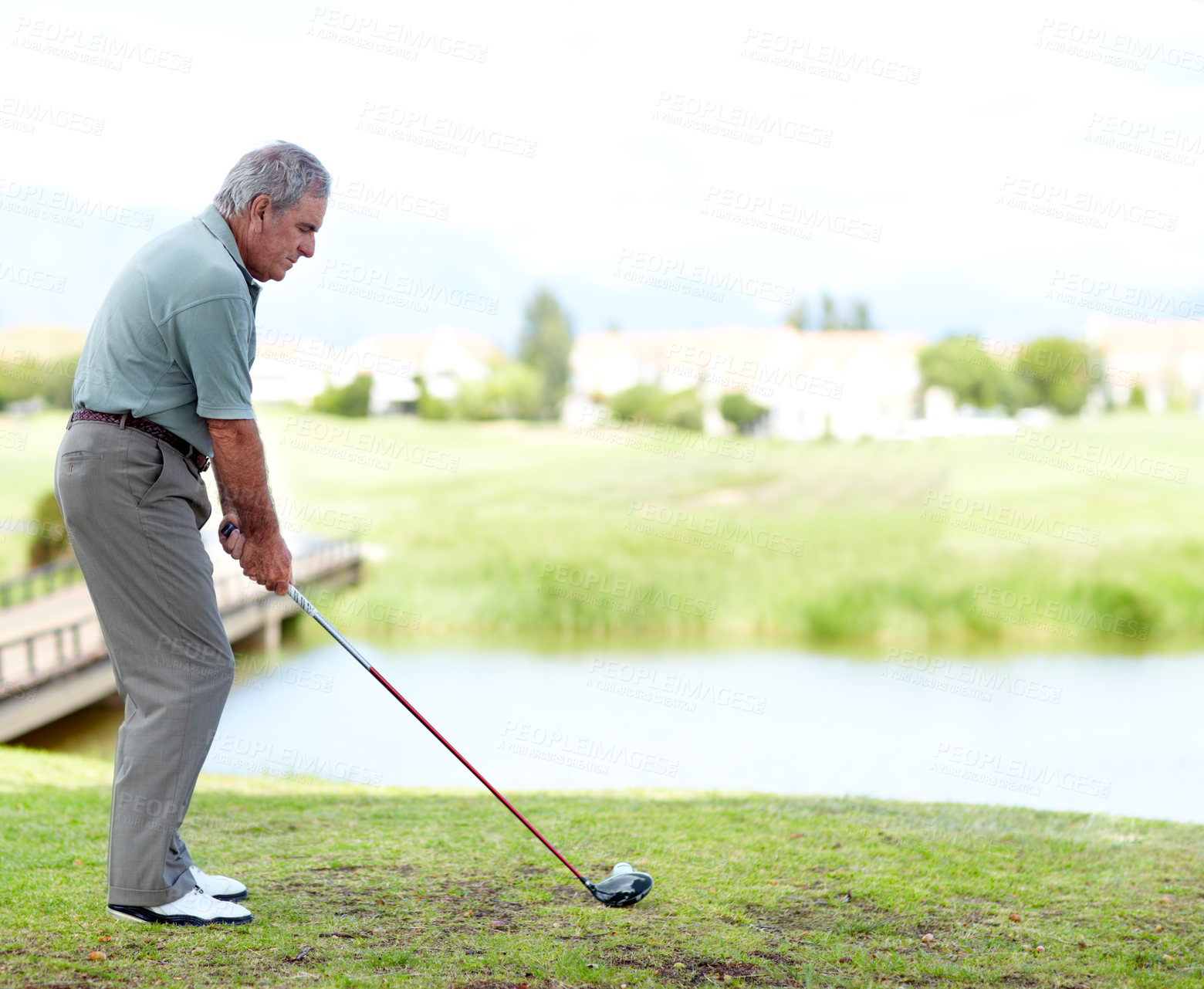 Buy stock photo Senior, man or golfer playing golf for fitness, workout or exercise with a swing on a green course. Stroke, person golfing or mature player training in sports game driving with a club in retirement