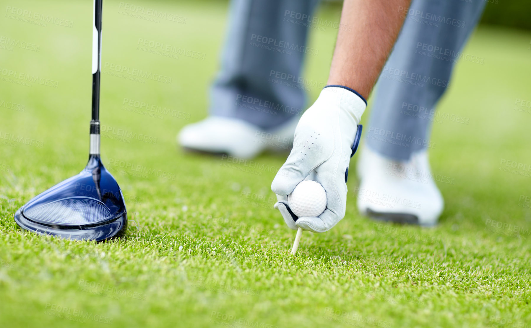 Buy stock photo Golf, closeup of man with sports club and ball on the grass course outside. Training or practice, sports with equipment and hand of a male athlete golfer outside for competition or tournament