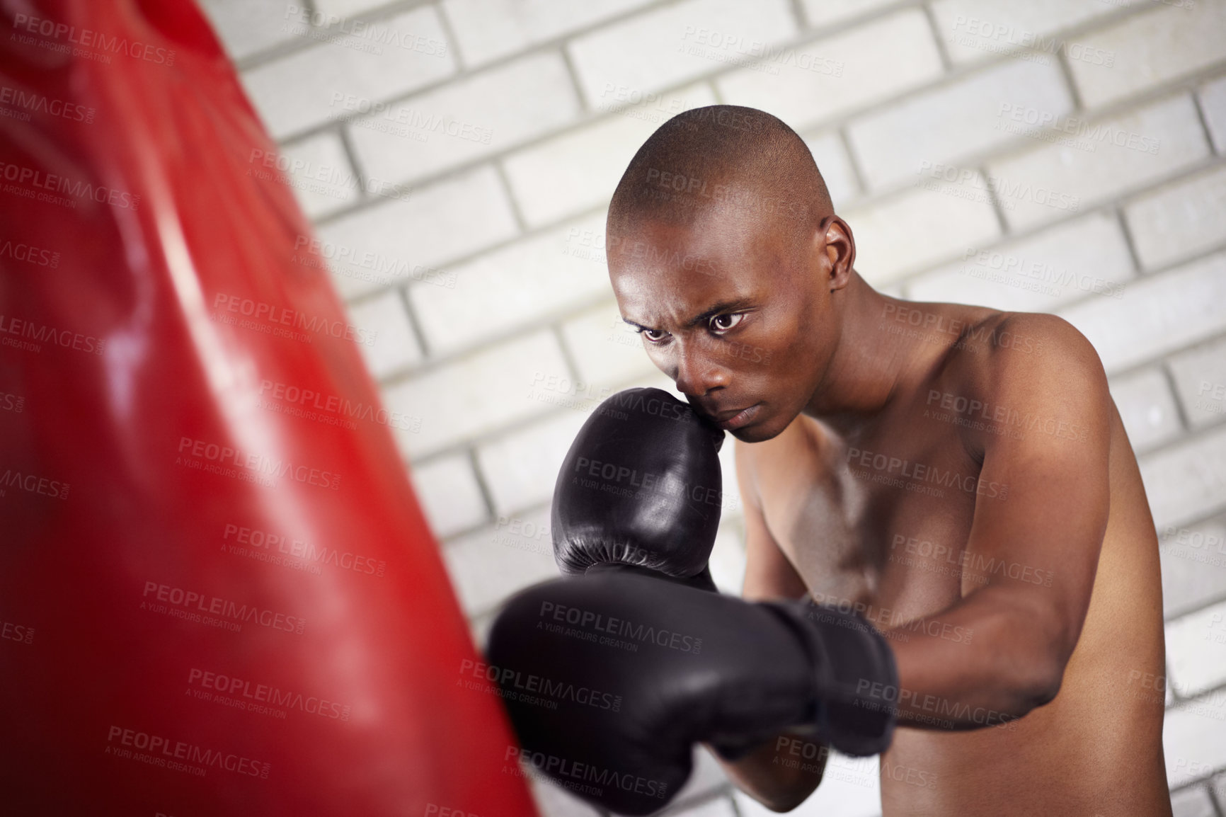 Buy stock photo Fist, punching bag or black man, boxer or sports fighter training for muay thai contest, kickboxing competition or challenge. Impact, power and athlete practice for workout, fitness or boxing fight