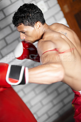Buy stock photo Power, punching bag or sports man, boxer or fighter training performance for kickboxing contest, competition or challenge. MMA action, gym equipment or strong warrior practice impact for boxing fight