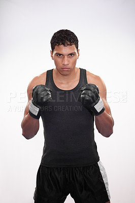 Buy stock photo Portrait, getting ready and a man or boxer for a competition, fitness or training on a white background. Exercise, cardio and a strong male fighter with gloves for a sport, boxing or workout