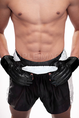 Buy stock photo Sports, strong body and mma man, boxer or fighter ready for contest, competition or fighting workout challenge. Abs muscle, torso and studio athlete training, exercise or boxing on white background