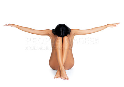 Buy stock photo A concept shot of an attractive female model with her arms raised and isolated on white