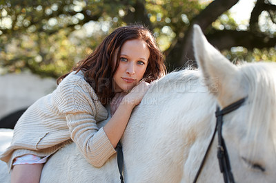 Buy stock photo Nature, portrait and woman laying on her horse on an outdoor farm for sports racing. Smile, happy and young person from Canada with her equestrian animal or pet in countryside ranch for adventure.