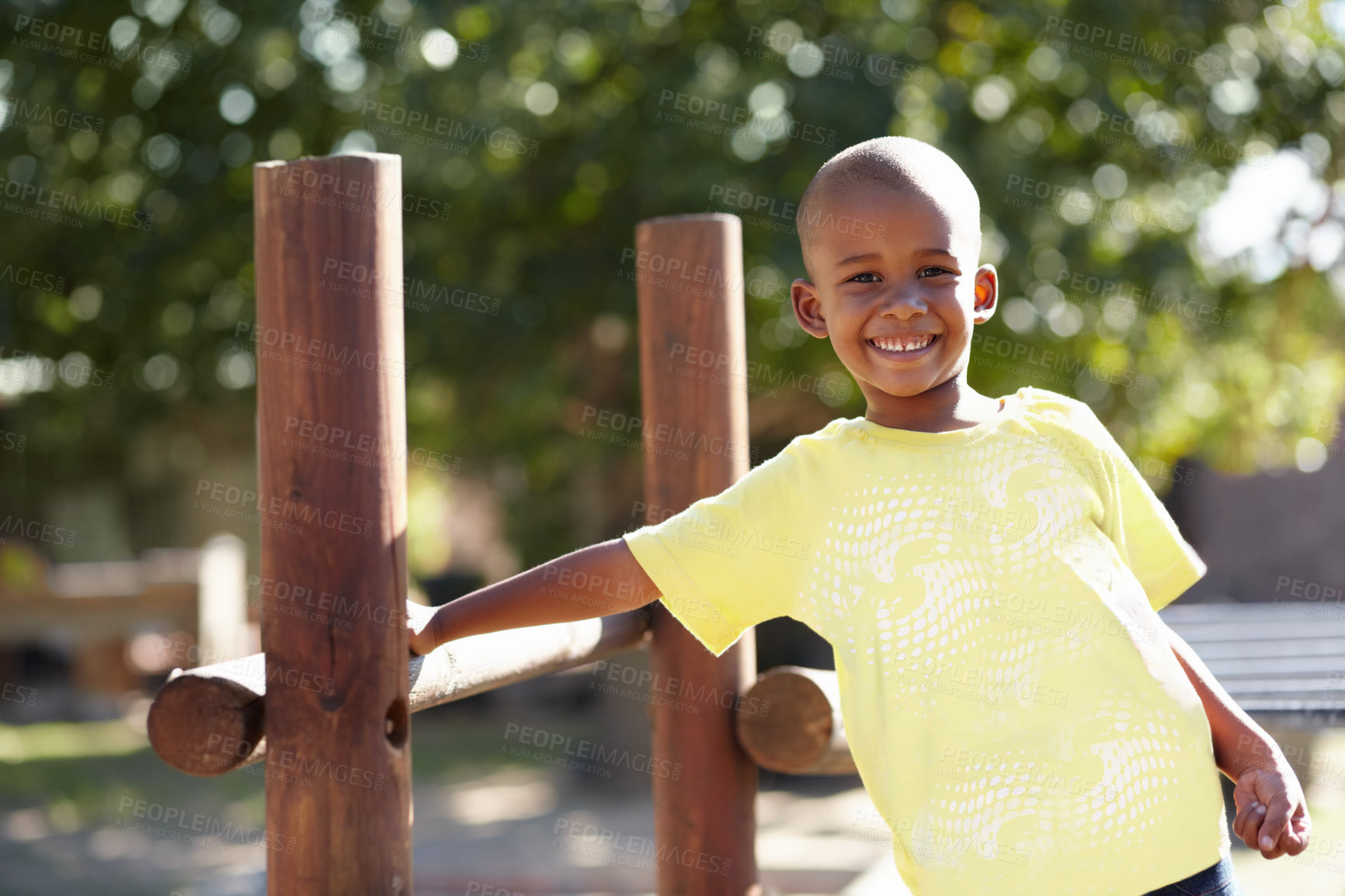 Buy stock photo African boy, portrait and playground at kindergarten, outdoor and sunshine for playing, games and freedom. Child, school garden or park with smile, happy and development in summer, nature or academy