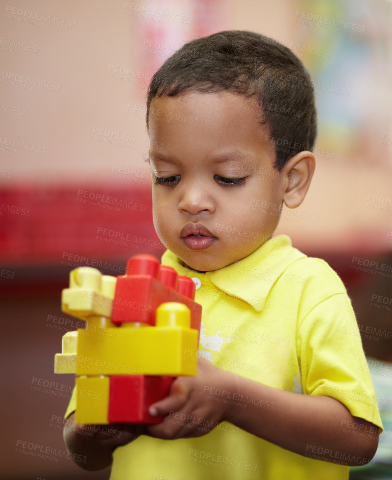 Buy stock photo Boy, education and building blocks in classroom for thinking, scholarship or development at kindergarten. Preschool student, kid and plastic toys for play, idea or learning problem solving at academy