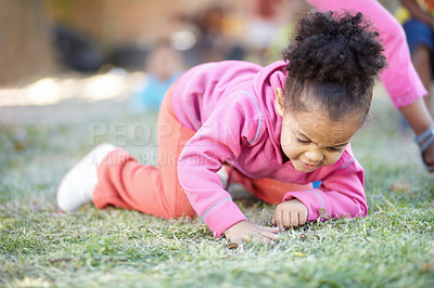 Buy stock photo Field, grass and girl with fun, curious and happy in the garden, nature and springtime with joy. Female person, happy toddler or infant in the backyard, outdoor or kindergarden with child development