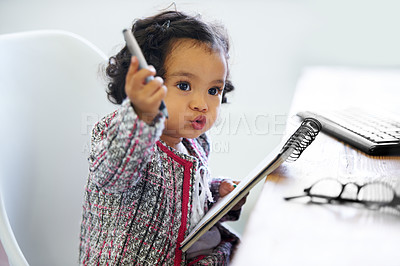 Buy stock photo Thinking, playing and a child with a notebook for drawing, art and creativity for a home hobby. Idea, inspiration and a girl, kid or baby with paper for education, learning and a picture at a desk