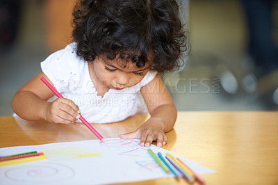 Buy stock photo Young, girl or drawing at table in classroom for creative development, education growth in kindergarten. Child, daycare or pencils artwork for learning play in school or paper crayons, craft or color