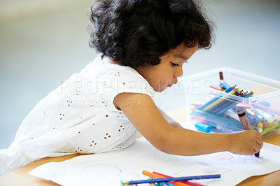 Buy stock photo Drawing, school and a child with paper for art, education or creativity in kindergarten. Psychology, development and a girl, kid or student writing with a picture in a creative classroom at preschool
