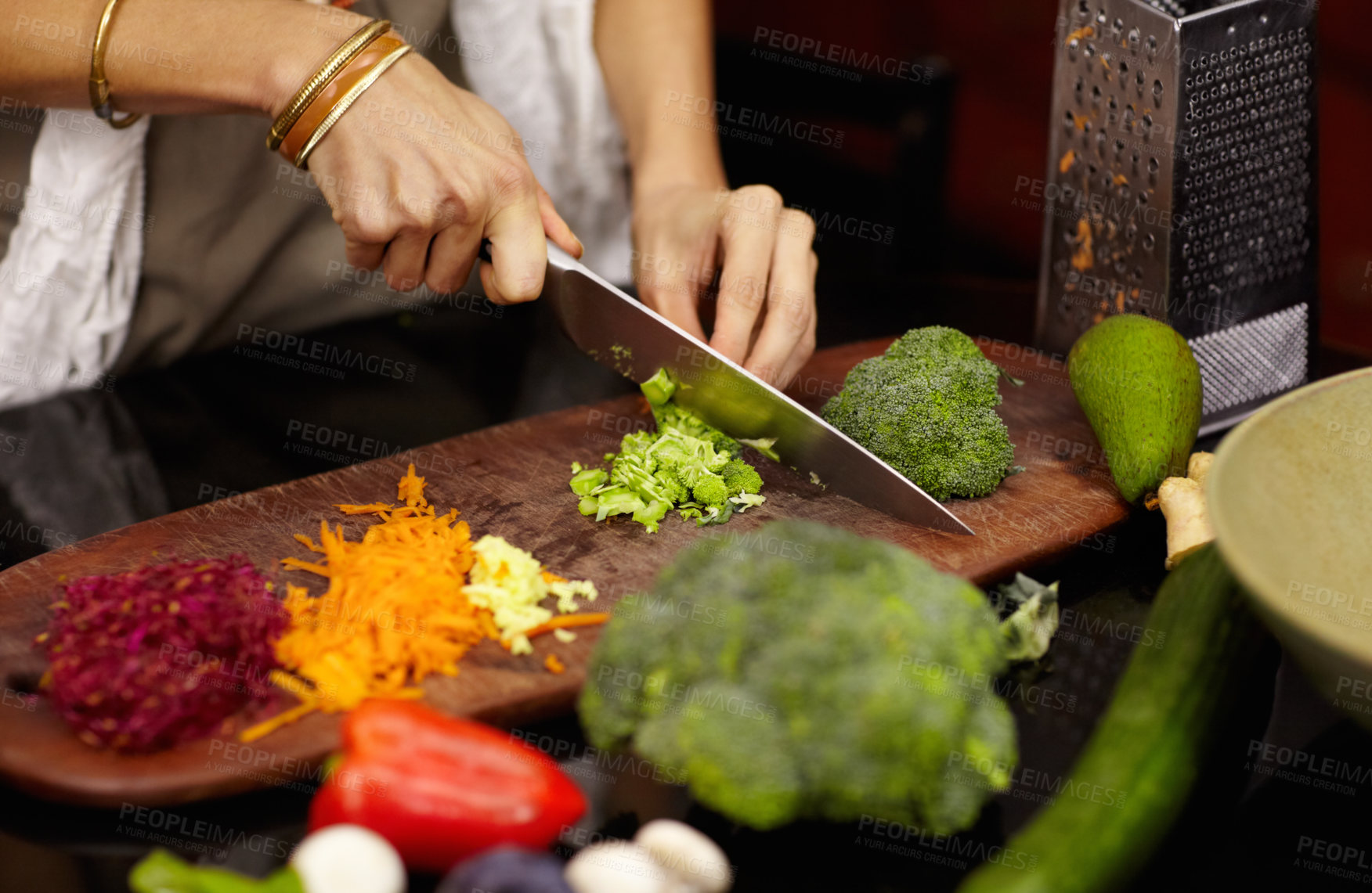 Buy stock photo Cropped image of a woman preparing dinner at home