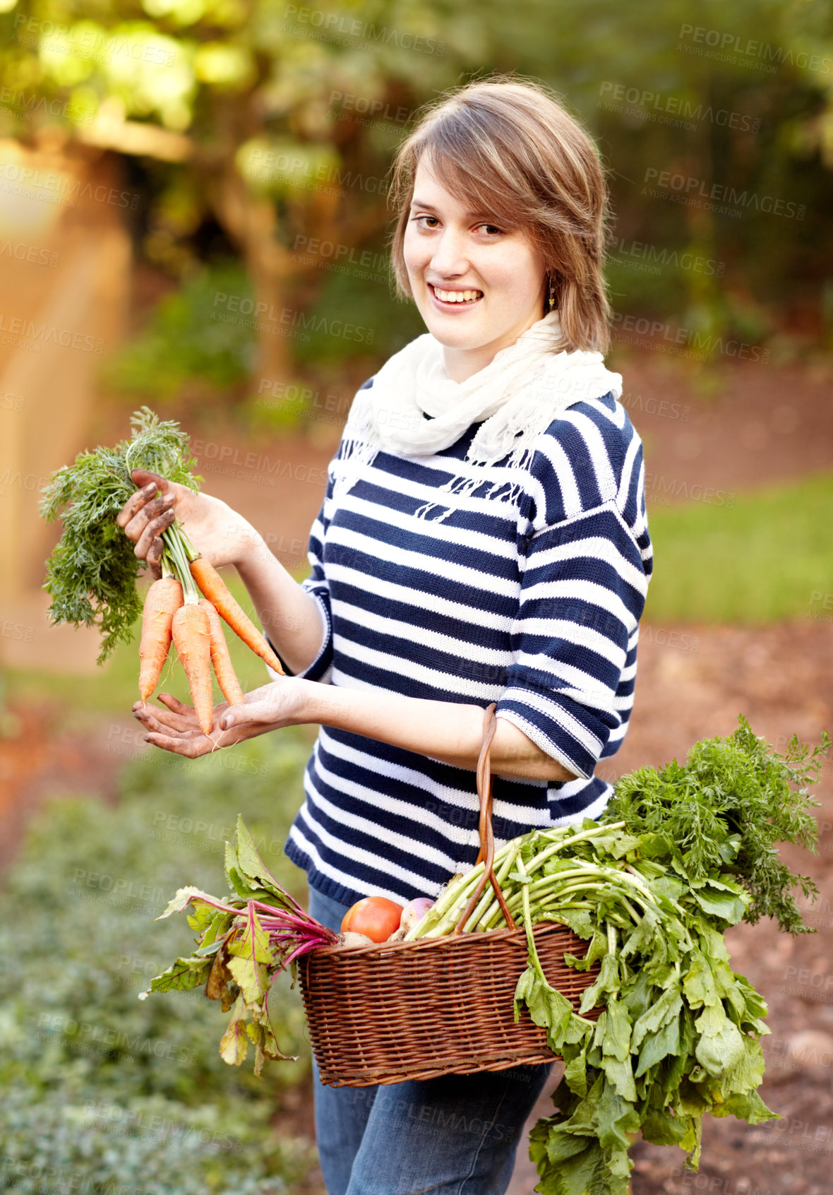 Buy stock photo Portrait, woman and vegetable for harvest with basket for fresh, natural or organic produce for vegan diet. Worker, farmer and smile for carrot, tomato or garden for growth in sustainable development