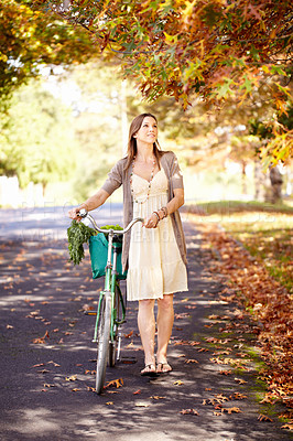 Buy stock photo Bicycle, woman and nature for fitness in cycling, summer vacation and eco friendly park with wellness and exercise. Norway, person and trendy fashion in garden, sustainability and happy in cityscape