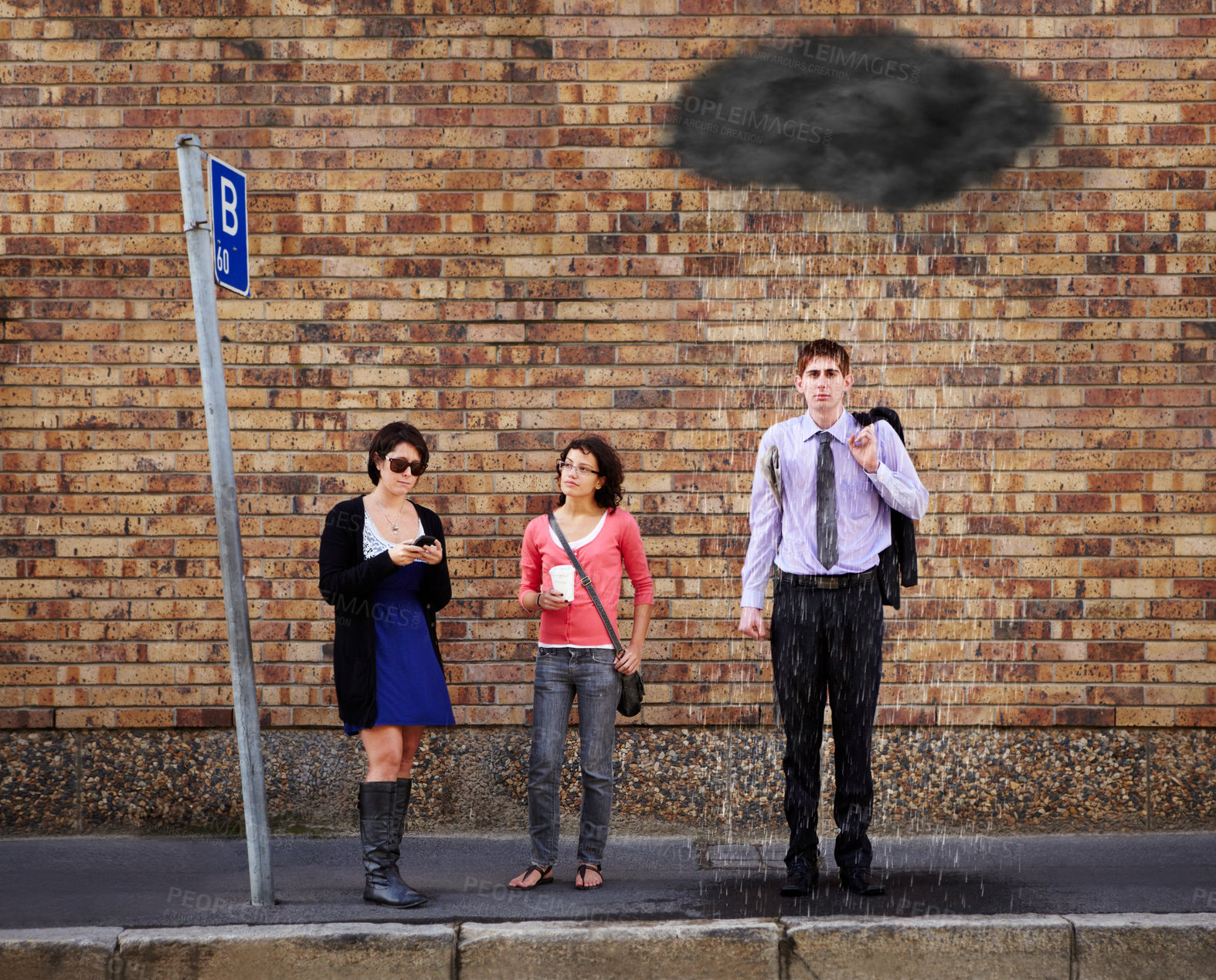 Buy stock photo A black rain cloud over the young man's head standing at the bus stop