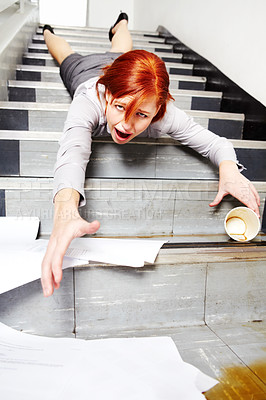 Buy stock photo Woman, falling down and stairs for injury, accident and wow with coffee, documents or paperwork in building. Business, person or employee slipping on steps at work or office with paper, cup and shock